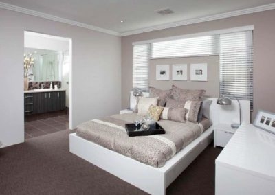 bedroom with white venetian blinds