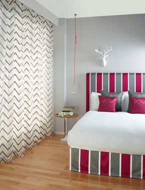 bedroom with zigzag curtains