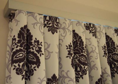 purple damask curtain detailing