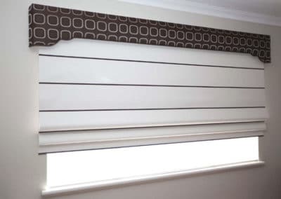 striped roman blinds with decorative pelmet
