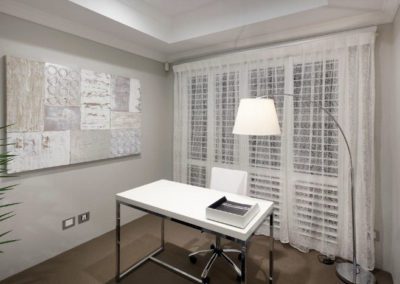 study with sheer lace curtains and shutter blinds